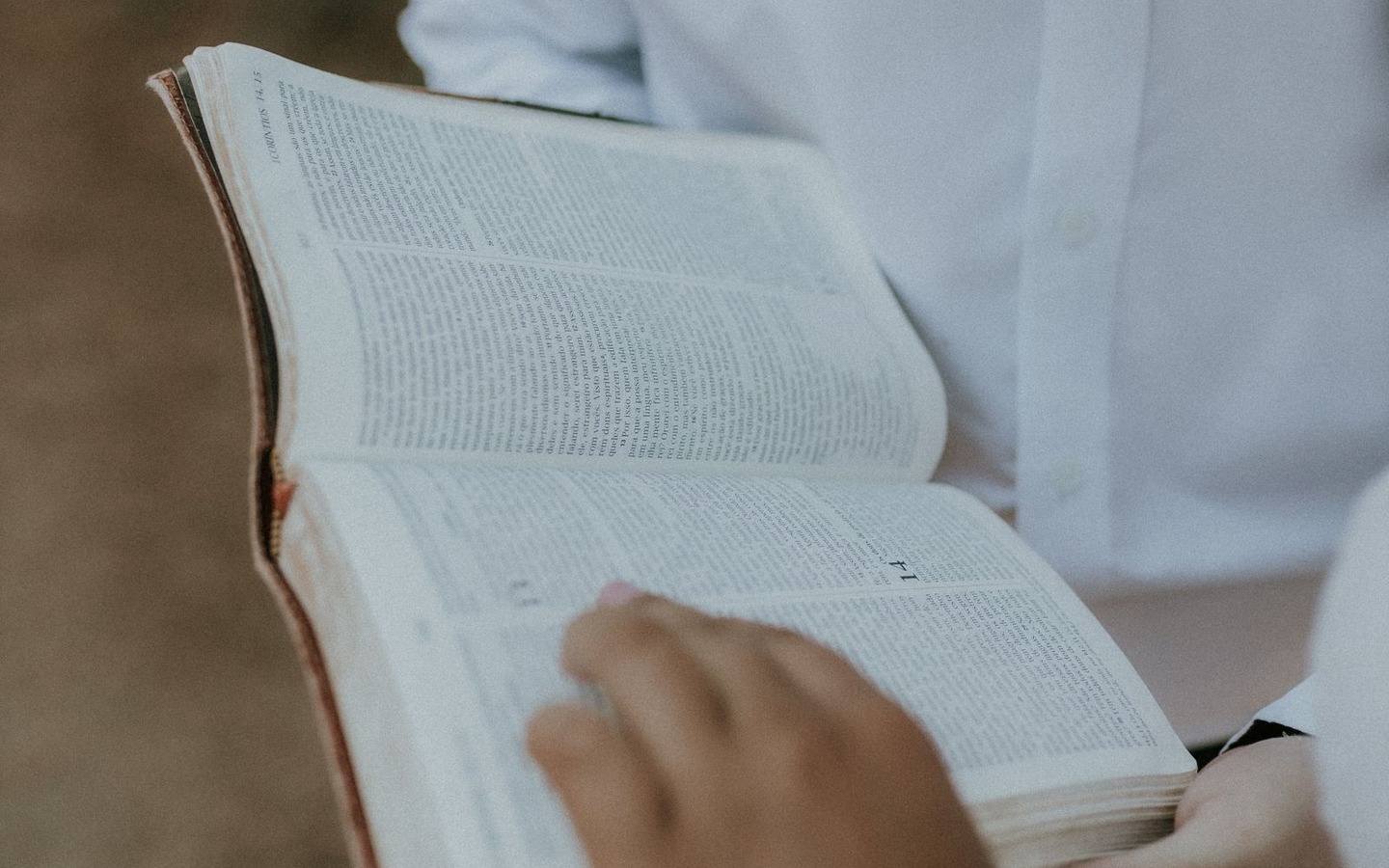 An open Bible being read